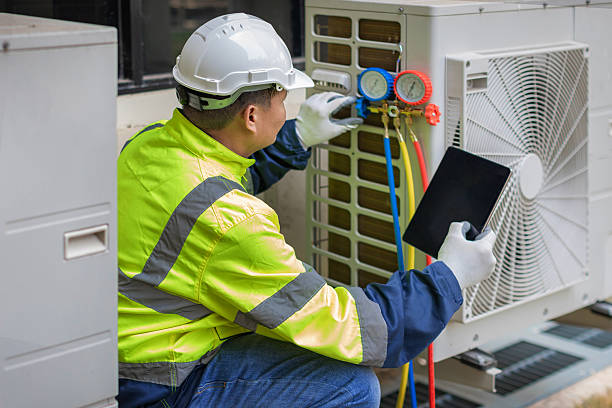 Professional Heat Pump Repair technician working in Von Ormy, TX